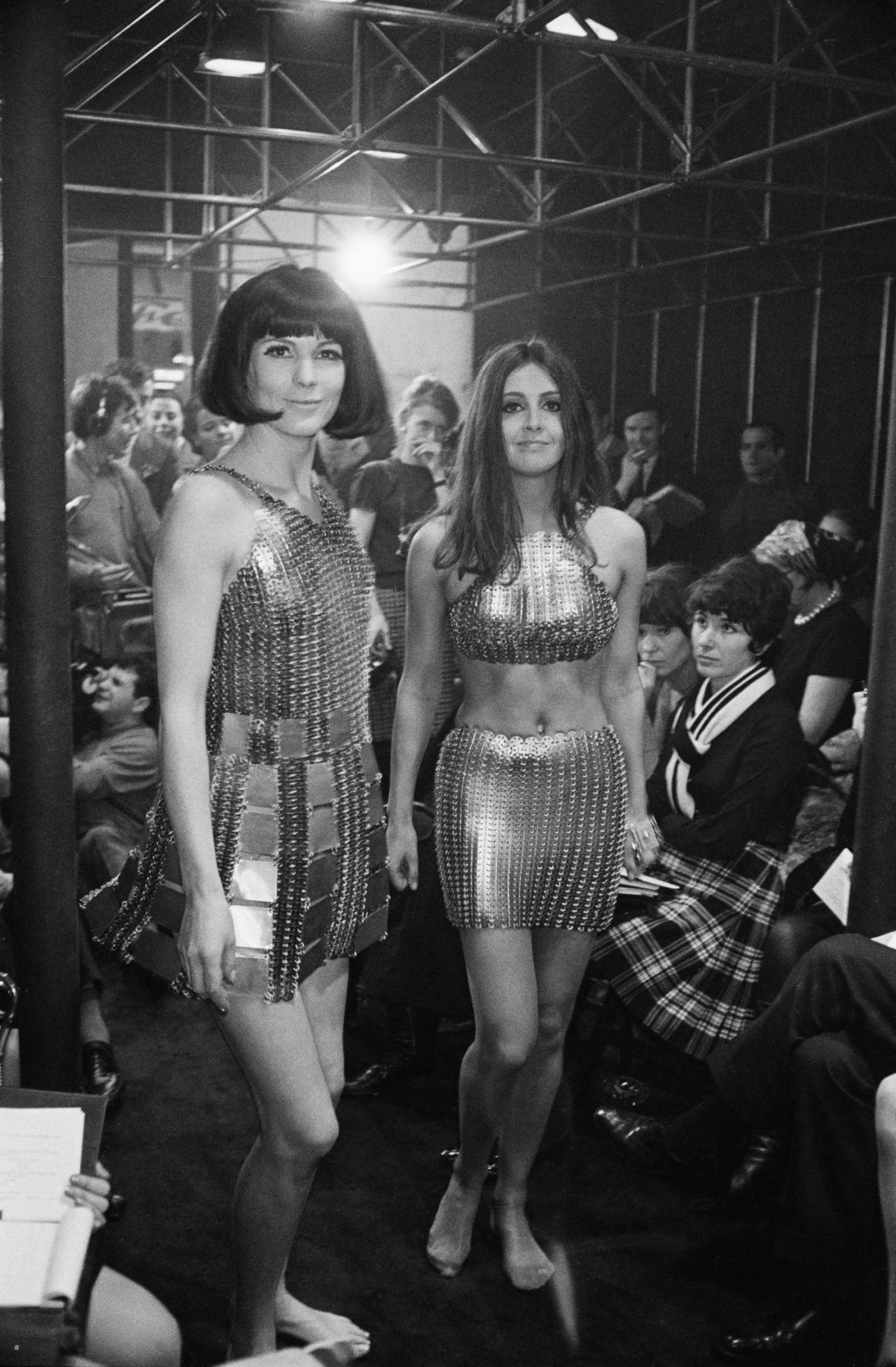 "It was everywhere, worn by all the major <em>yé-yé</em> singers -- the rock and roll girls of France — and Brigitte Bardot and Barbarella also wore Paco Rabanne." (Pictured: Models wear Paco Rabanne evening dresses, 1967) 