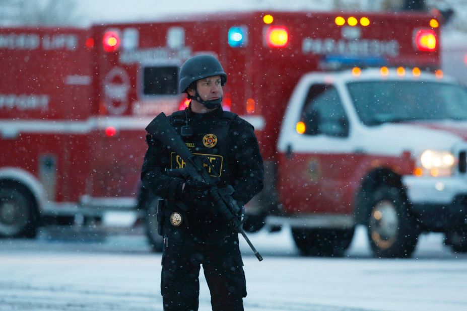 A police officer stands guard.