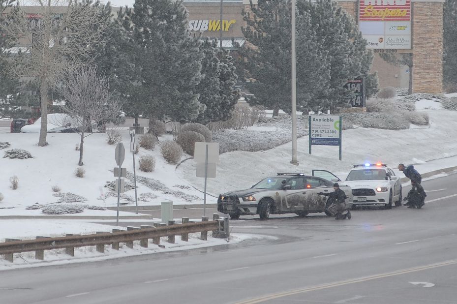 Police officers respond to the scene.