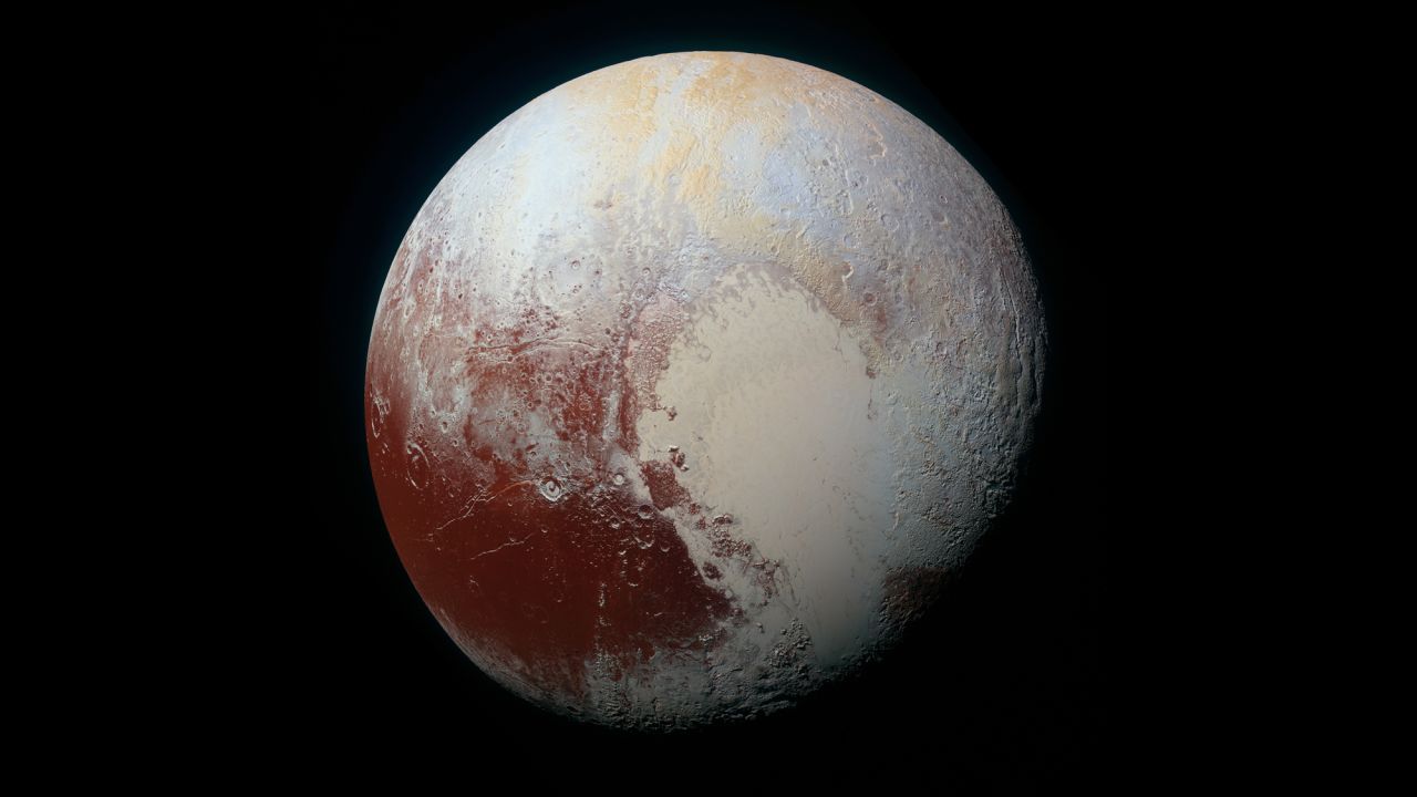 <strong>July 14:</strong> NASA's <a href="http://www.cnn.com/2014/08/25/tech/gallery/pluto/index.html" target="_blank">New Horizons spacecraft</a> captured this enhanced-color view of Pluto before flying by the icy world and its moons. The mission completed what NASA calls the reconnaissance of the classical solar system, and it made the United States the first nation to send a space probe to every planet from Mercury to Pluto.