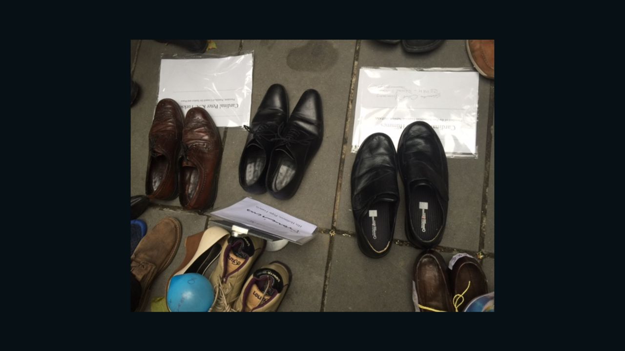 Activists laid out shoes where demonstrators might have stood.