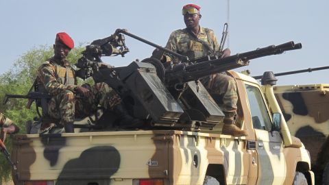 Cameroonian army soldiers patrol the country's Far North Region as part of a deployment against against Boko Haram in June 2014.