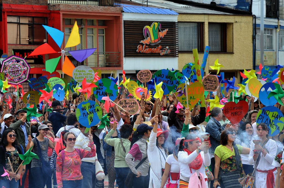 People take part in the Global Climate March in Bogota, Colombia.