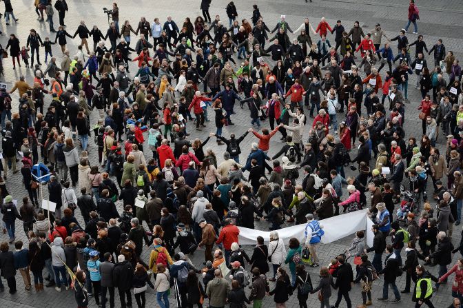 People form a human chain in Nantes, France.