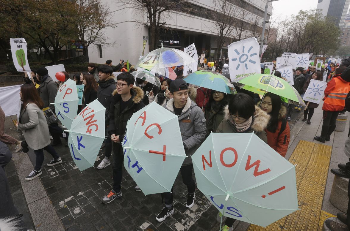 Environmental activists march in Seoul, South Korea.