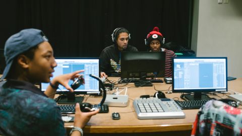 Students participate in a music production class at TRUE Skool, an afterschool program in Milwaukee that uses arts and humanities to engage high school students in social justice and community service. Over the past decade, the nonprofit has paired hundreds of black, white and Latino teens with local artists to learn how to use the arts to cope with the despair of their surroundings.