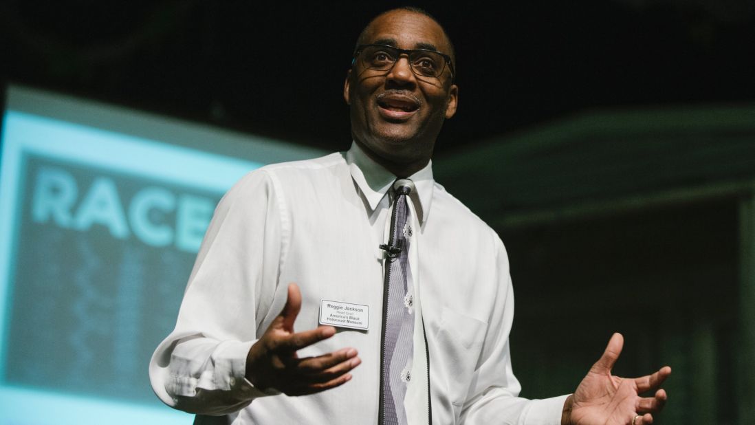 Milwaukee schoolteacher Reginald Jackson speaks at Marquette University's Helfaer Theatre on Monday, November 16, during a presentation about the African-American perspective of the novel "To Kill A Mockingbird." Jackson chairs the board of America's Black Holocaust Museum in Milwaukee, one of the country's most segregated cities.