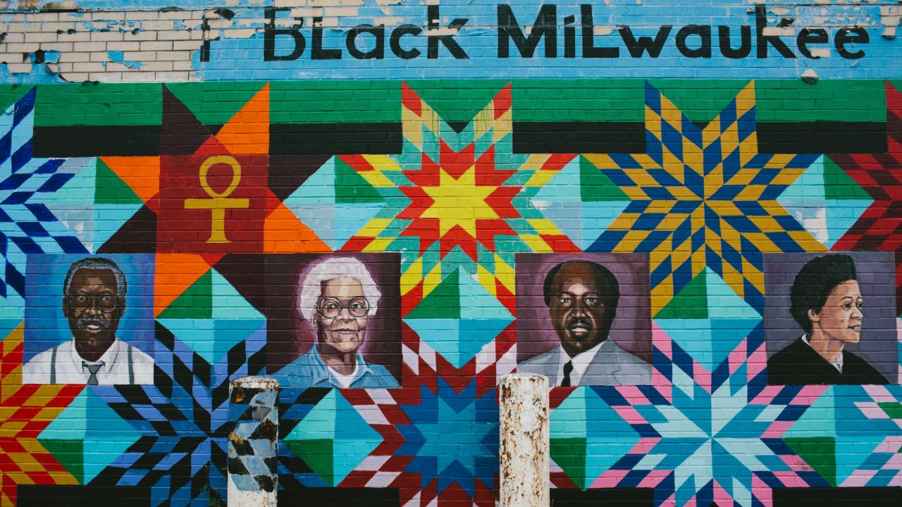 Famous black Milwaukeeans are seen on a mural off North Avenue in the Bronzeville neighborhood. In Milwaukee, African-Americans are overwhelmingly concentrated in the city and a few nearby suburbs. The surrounding suburban counties are overwhelmingly white.