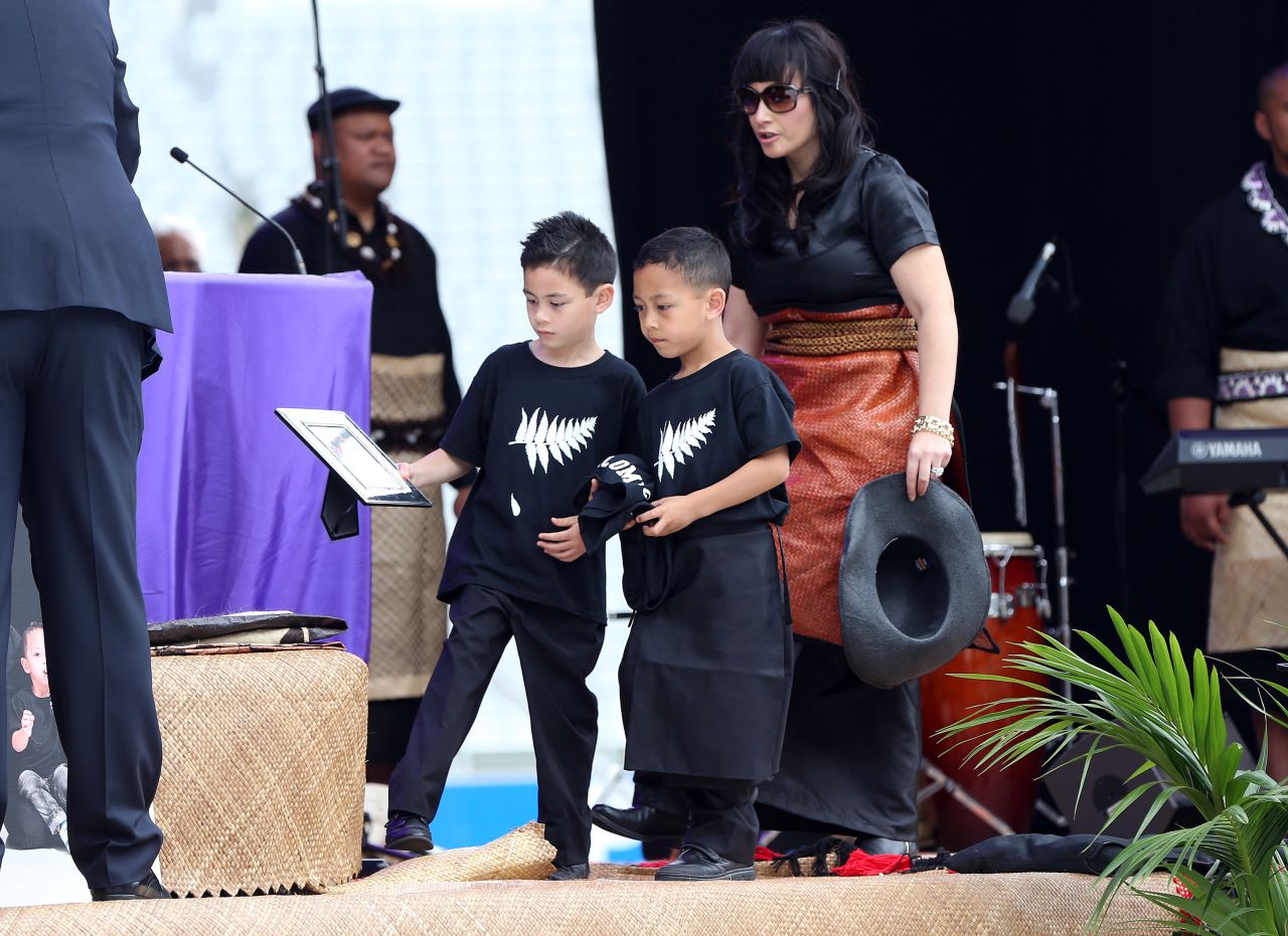 Lomu leaves behind wife Nadene and her two sons, Brayley (L) and Dhyreille, who were at Eden Park for the service.