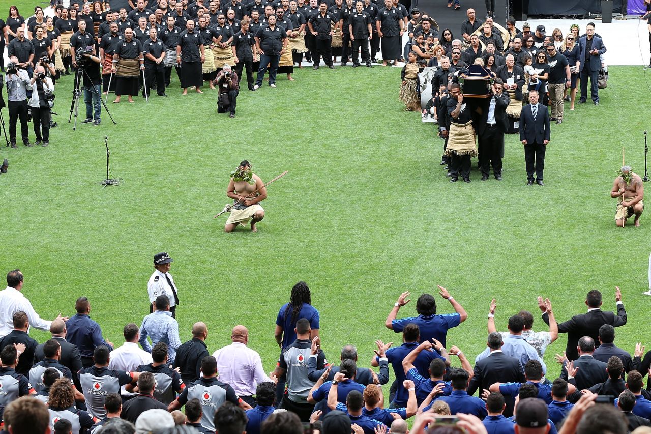 Former All Blacks, including some who played alongside Lomu, performed an emotional haka as his coffin left the field at Eden Park.