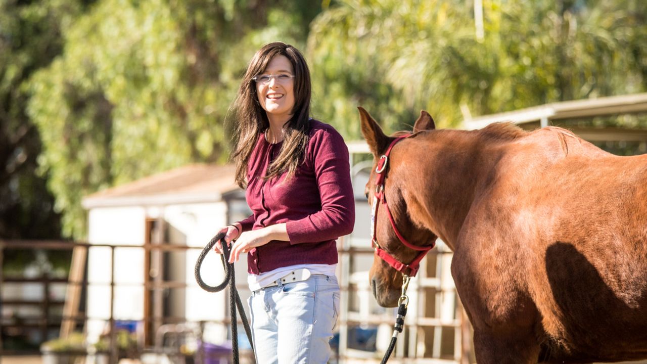 Shelly May's health problems have been helped by horse therapy.