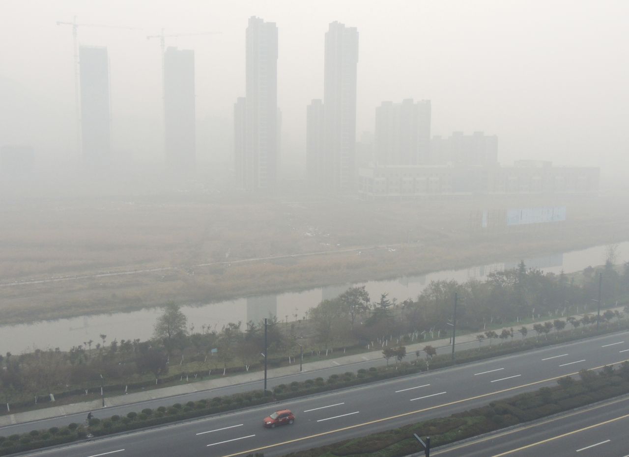 Residential blocks are cloaked in smog in Lianyungang, in eastern China's Jiangsu province, on November 30.
