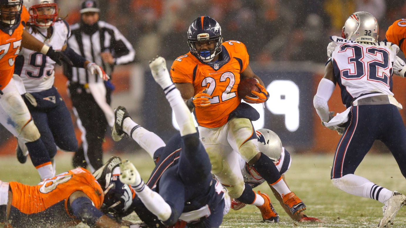 Denver running back C.J. Anderson breaks away from New England defenders to score the game-winning touchdown in overtime Sunday, November 29. The Broncos improved their record to 9-2 with the 30-24 home victory. It was the first loss of the season for New England (10-1), last year's Super Bowl champions.