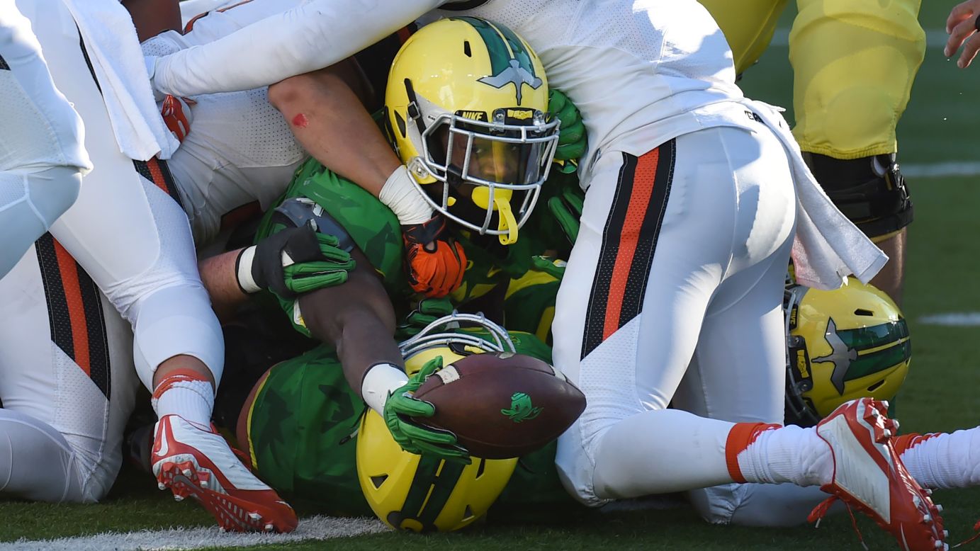 Oregon running back Royce Freeman reaches the ball over the goal line during a home game against Oregon State on Friday, November 27. Oregon won the "Civil War" 52-42.