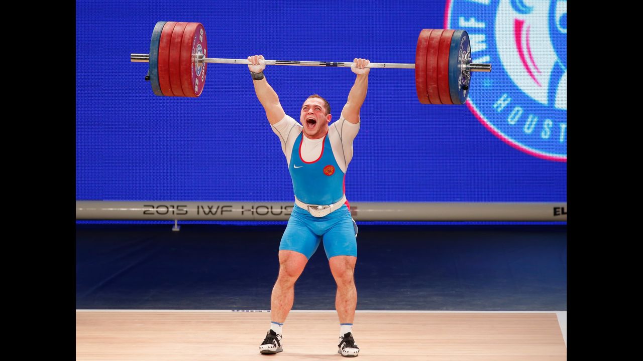 Russian weightlifter Artem Okulov rejoices Wednesday, November 25, during the Weightlifting World Championships in Houston. Okulov won gold in his weight class of 85 kilograms (187 pounds).