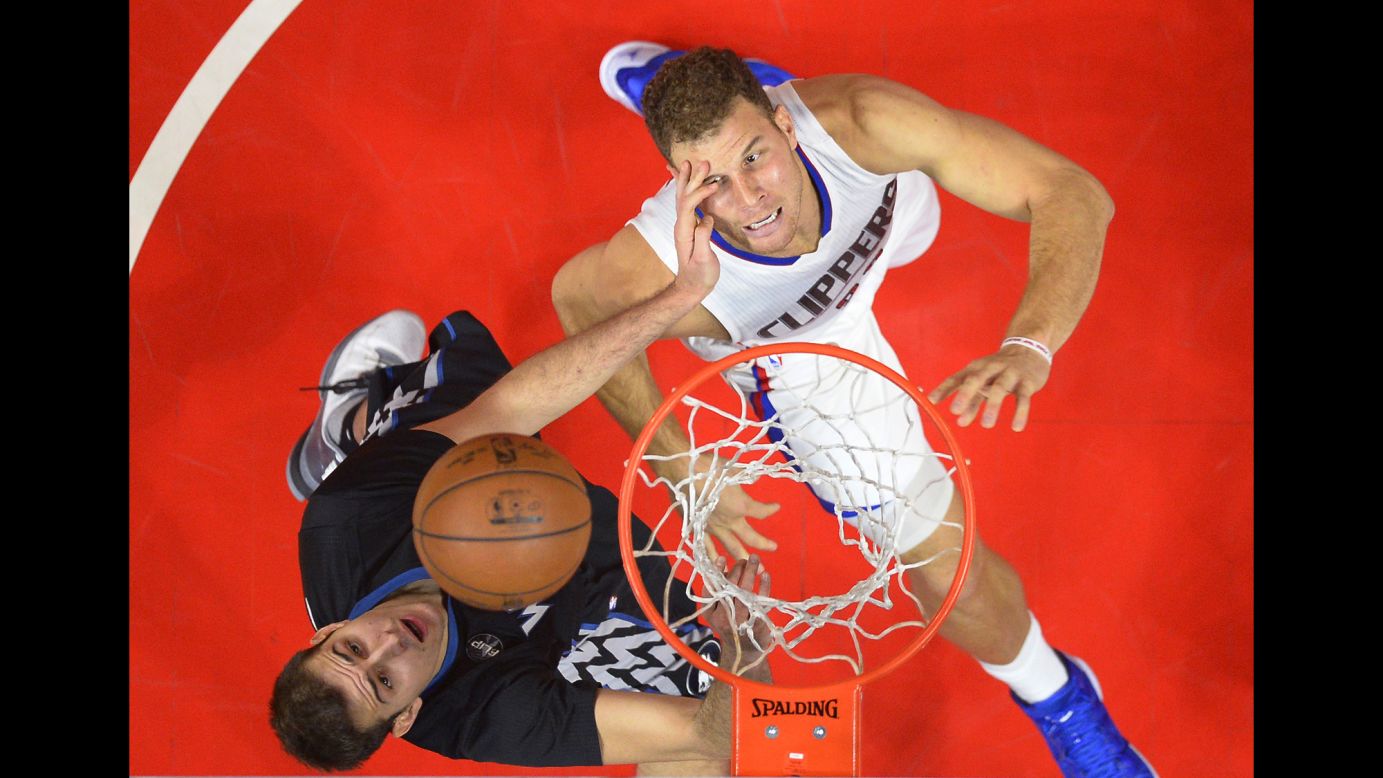 Los Angeles Clippers forward Blake Griffin is hit in the face by Minnesota's Nemanja Bjelica as they battle for a rebound during an NBA game in Los Angeles on Sunday, November 29.