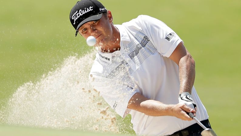 Matt Jones plays out of the bunker during the fourth round of the Australian Open on Sunday, November 29. Jones, an Australian, ended up winning the tournament -- his first win on the PGA Tour.