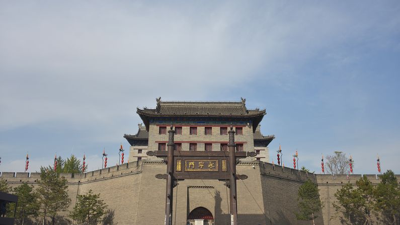 South Gate (pictured) is the oldest and grandest gate. Accessible only through a drawbridge across a moat, each gate consists of a multi-story archer's tower. Other structures like watchtowers and corner towers dot the city wall, making it one of the most impressive defense systems in ancient China.