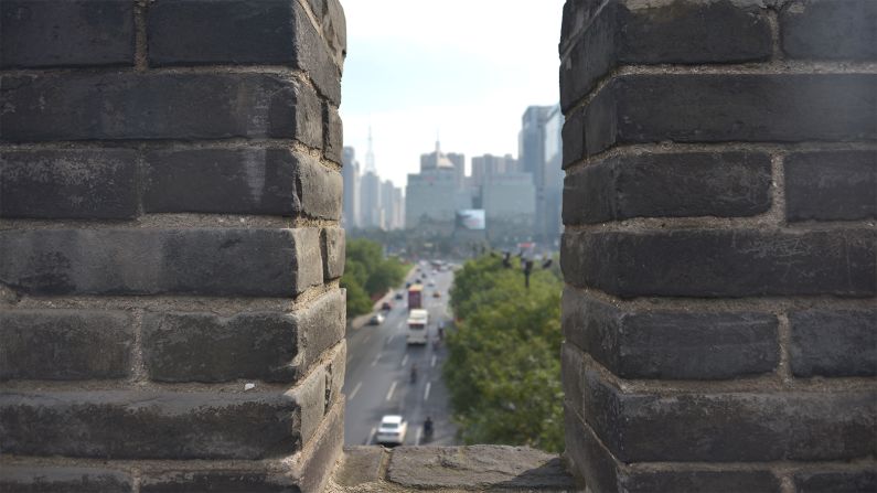 The top of the wall offers a unique view of the contrasting faces of this ancient Chinese city.