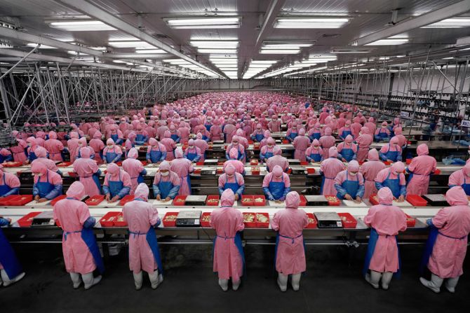 For his "China" photo series, he captures the world of factories and mass production. 