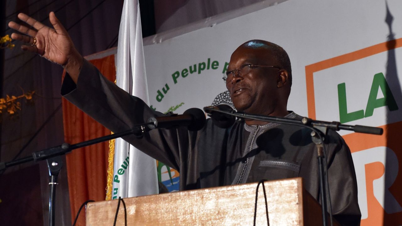 File photo: Roch Marc Christian Kabore waves to supporters in Ouagadougou on December 1, 2015 after winning Burkina Faso's presidential election.