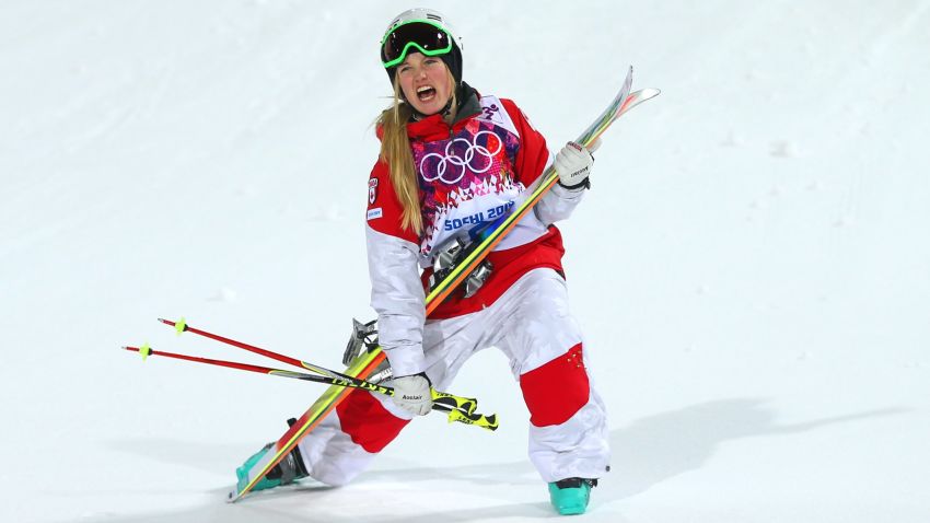 SOCHI, RUSSIA - FEBRUARY 08:  Justine Dufour-Lapointe of Canada celebrates winning gold in the Ladies' Moguls Final 3 on day one of the Sochi 2014 Winter Olympics at Rosa Khutor Extreme Park on February 8, 2014 in Sochi, Russia.  (Photo by Mike Ehrmann/Getty Images)