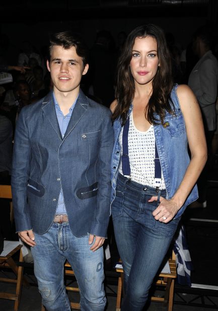 Carlsen is one of the most famous chess personalities the sport has seen in recent years. Here, he and actress Liv Tyler attend the G-Star Spring fashion show in New York, 2011. 