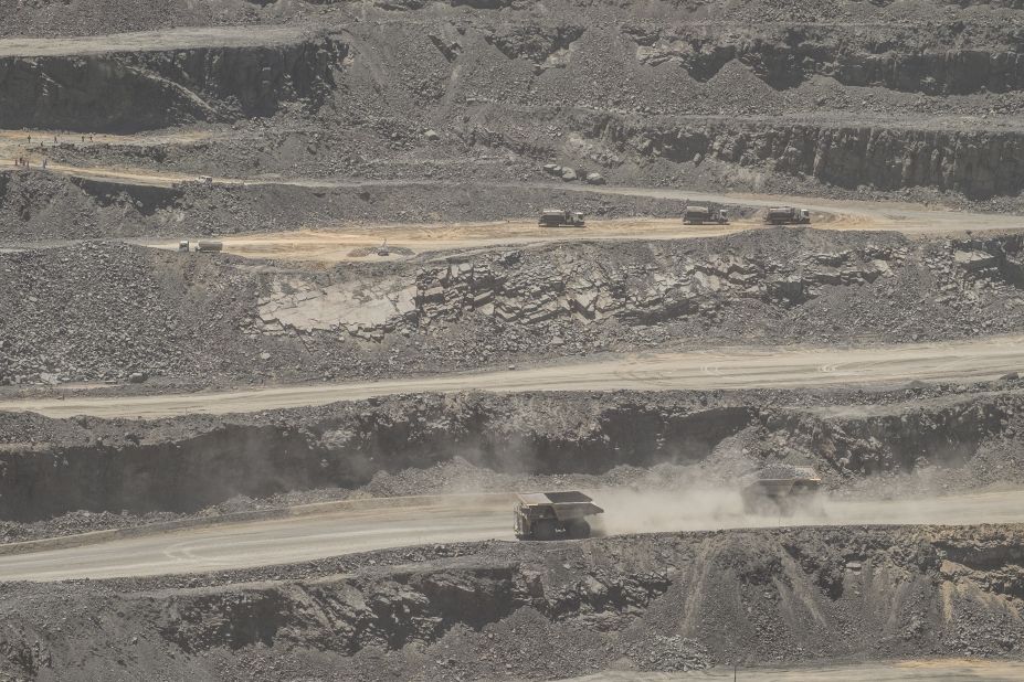 Trucks cross in the main pit of the Jwaneng diamond mine in Botswana, November 2015