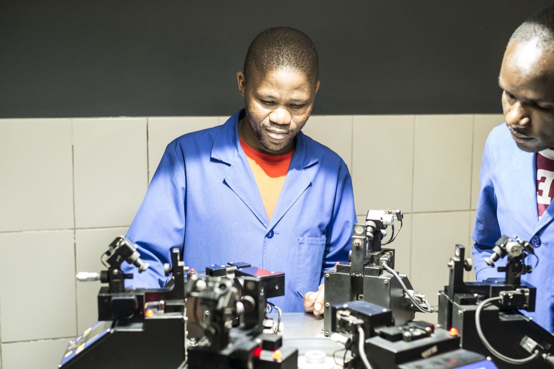 A KGK Diamonds employee polishes a diamond at the company's factory in Gaborone, Botswana.