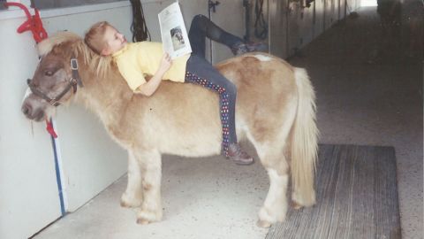 Sarah struggled to make friends because other students teased her about her medical issues. She would come home and read stories to her pony, Georgie Porgy, because he never made her feel different or judged. 