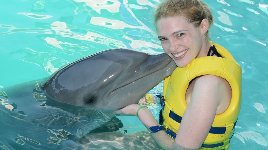 Sarah always wanted to swim with dolphins, but her disease made it impossible for her to even get in the water. Now, she often takes on new adventures.