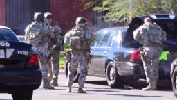 A swat team arrives at the scene of a shooting in San Bernardino, Calif. on Wednesday,  Dec. 2, 2015.  Police responded to reports of an active shooter at a social services facility. (Doug Saunders/Los Angeles News Group via AP) MANDATORY CREDIT