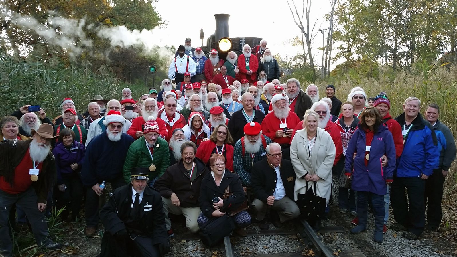 The 2015 Charles W. Howard Santa Claus School participants pose for a photo at Huckleberry Railroad.