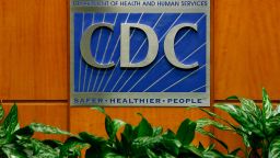 A podium with the logo for the Centers for Disease Control and Prevention  at the Tom Harkin Global Communications Center on October 5, 2014 in Atlanta, Georgia.