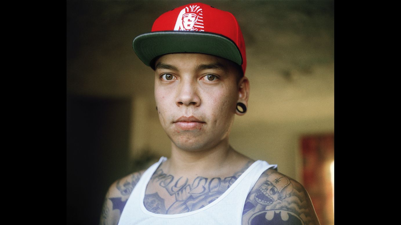 A young man named Alejandro is photographed at his home north of Monterrey, Mexico, in June 2014. He is not affiliated with any gangs, photographer Tom King said, but he has lost a number of friends to violence. King spent two and a half years in the Monterrey area, trying to learn more about its young men and the brutality around them.