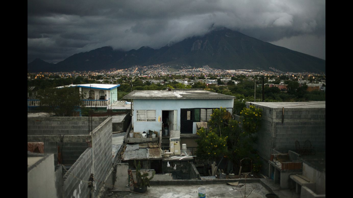 The mountain El Cerro de la Silla serves as the backdrop for Monterrey in this photo from July 2013. The San Rafael neighborhood, seen in the foreground, contains public and informal housing projects, King said.