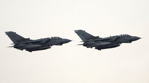 LIMASSOL, CYPRUS:  Two British RAF tornado fighter jets land at RAF Akrotiri after returning from a mission over Iraq in 2014. The British Parliament voted this week to allow the jets to strike in Syria.