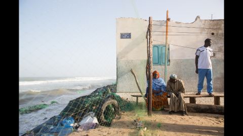 A particularly high tide eats away at the coastline, and while younger community members work to fortify the coast, a couple observes the unfolding damage. Rybus said the Senegalese government has been responding and paying very close attention to climate change and its effects on the nation.