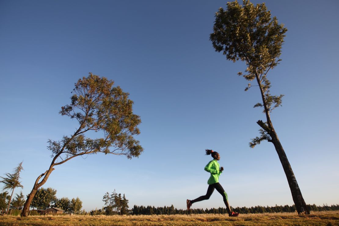 Mary Keitany of Kenya, winner of the 2011 London Marathon, during a training run in Iten.