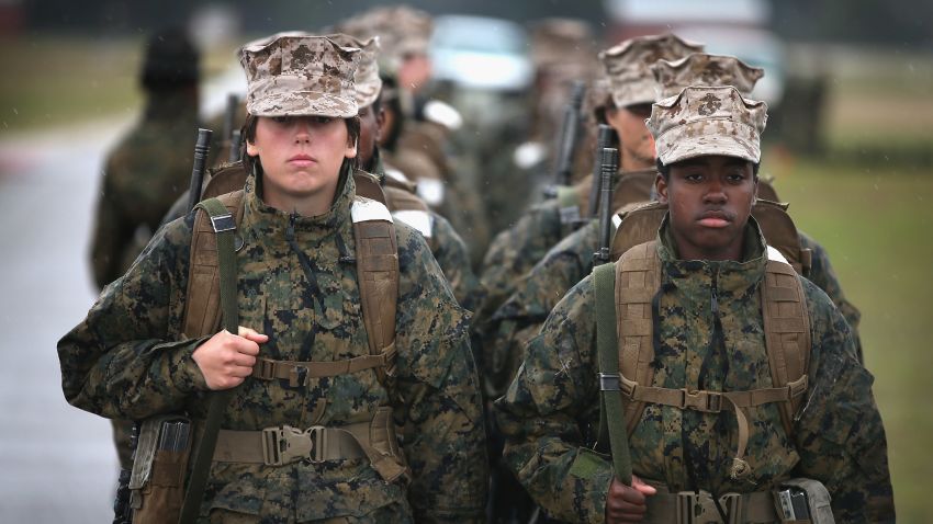 Female Marine recruits prepare to fire on the rifle range during boot camp February 25, 2013 at MCRD Parris Island, South Carolina.