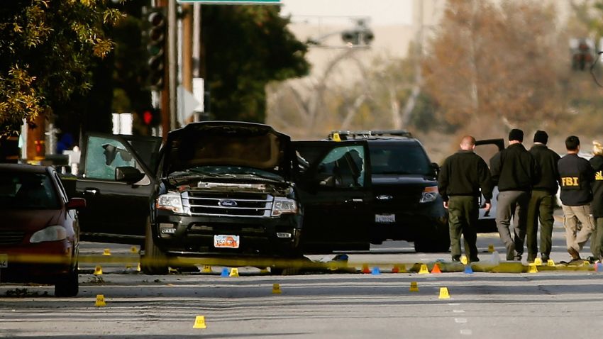 SAN BERNARDINO, CA - DECEMBER 03:  FBI agents and local law enforcement examine the crime scene where suspects of the Inland Regional Center were killed on December 3, 2015 in San Bernardino, California. Police continue to investigate a mass shooting at the Inland Regional Center in San Bernardino that left at least 14 people dead and another 17 injured. (Photo by Sean M. Haffey/Getty Images)