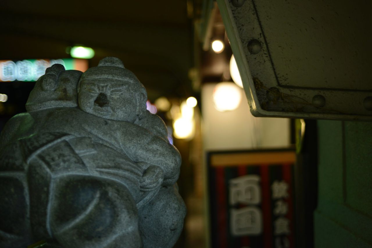 During the out-of-town tournaments, Ryogoku is quiet but especially during the three annual Tokyo Grand Tournaments, the place thrums with a unique mix of culture and tradition, with rikishi an ever-present sight in the neighborhood. <br /><br />Reminders of the neighborhood's association with the sport, like this small statue in the west entrance of Ryogoku station, are everywhere. 
