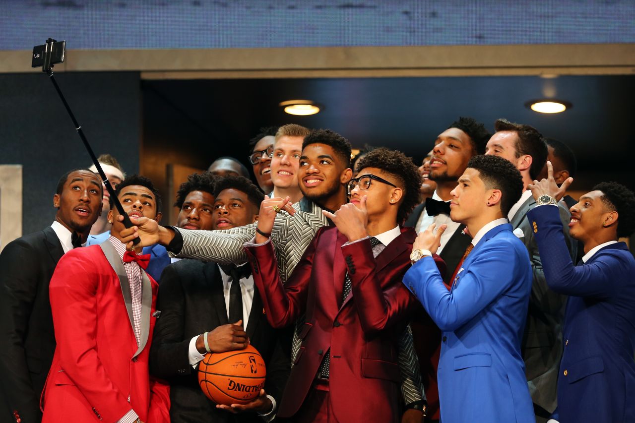NBA newcomers, such as this group at the 2015 Draft in New York, face tough decisions even before their first pro games. Most seek the advice of professional fashion consultants to deck them out for the big night.