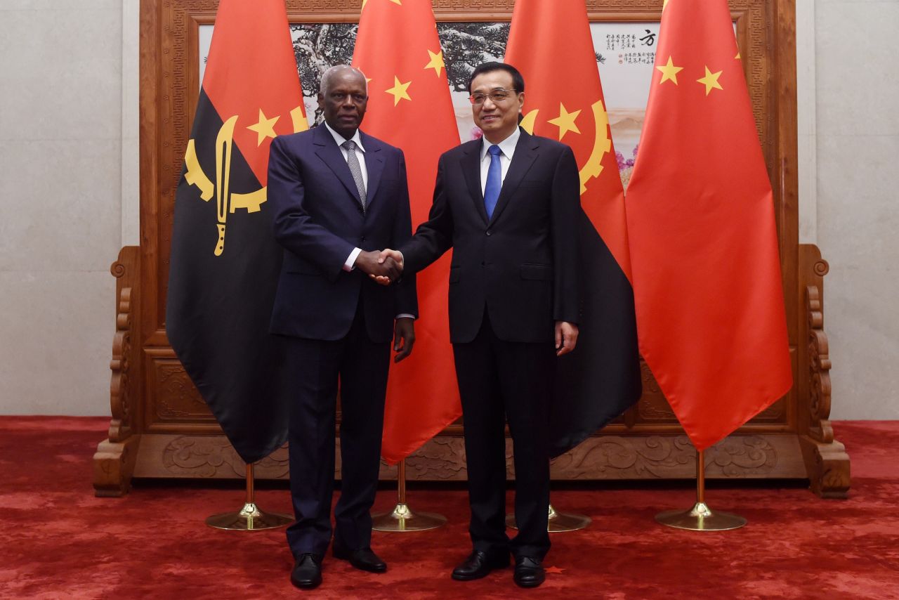 Angolan President Jose Eduardo Dos Santos shakes hands with Chinese premier Li Keqiang before their meeting in Beijing, June, 2015. Angola is Africa's second largest oil producer, and their biggest buyer is China. 