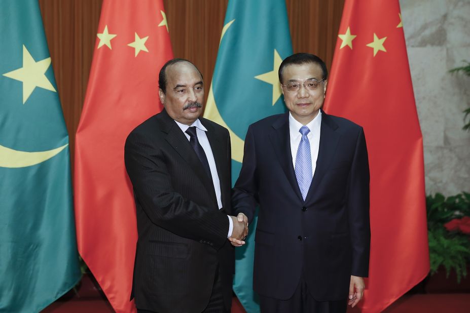   Mauritania's President Mohamed Ould Abdel Aziz (L) shakes hands with Chinese Premier Li Keqiang at the Great Hall of the People on September 15, 2015 in Beijing, China.  Mauritania has seen significant investment from China, particularly in the important Nouakchott Port.  The relationship has endured despite frequent political instability in  Mauritania.  