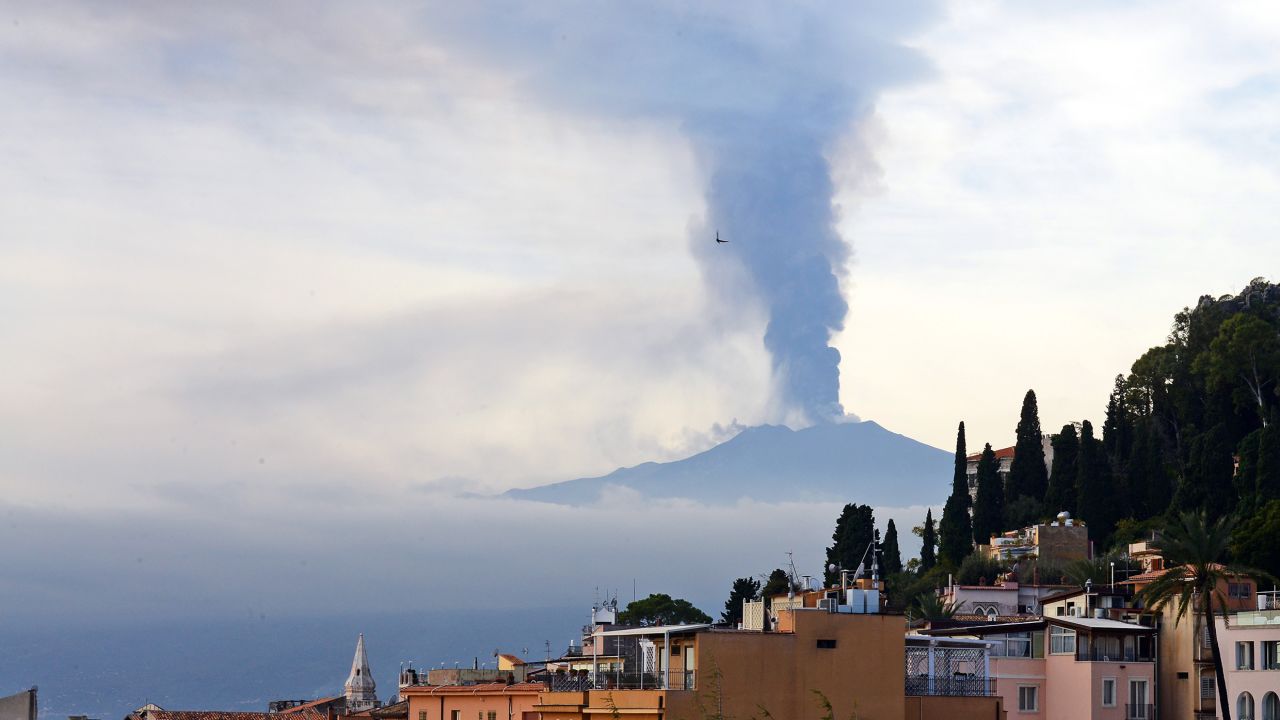 Smoke rises over the Italian city of Taormina during an eruption of Mount Etna, one of the most active volcanoes in the world, in December 2015.