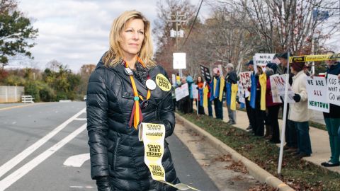 Martina Leinz, 53, stands in front of the National Rifle Association headquarters in Fairfax, Virginia, along with other gun control advocates on November 14, 2015. Leinz has been to more than two dozen NRA protests, beginning with the first one, held after the December 14, 2012, massacre in Newtown, Connecticut. Leinz was a junior in high school in 1979 when the effects of gun violence hit home. Her classmate, Brenda Spencer, used a high-caliber rifle to open fire on an elementary school in San Diego. She killed the principal and a janitor who came to his aid and wounded eight children. "It was horrifying to me that somebody who I knew could do something like that," Leinz says. "It opened my eyes to the dangers."