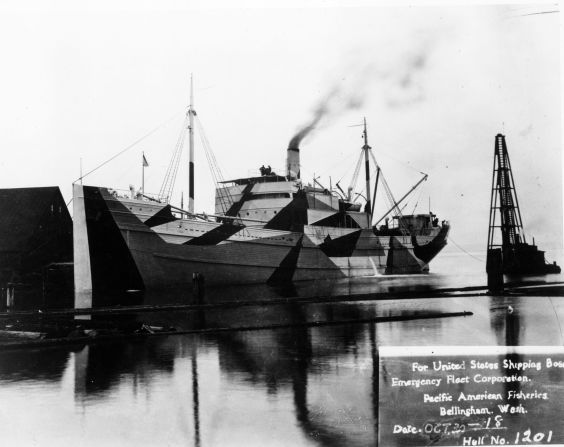 A wooden ship built for the U.S. Shipping Board Emergency Fleet Corporation in Bellingham, Washington. The majority of wooden boats constructed never saw war service. Most were sold for salvage and then burned and sunk. This particular boat was painted with <a href="index.php?page=&url=http%3A%2F%2Fwww.shipcamouflage.com%2F1_4.htm" target="_blank" target="_blank">"dazzle" camouflage. </a>