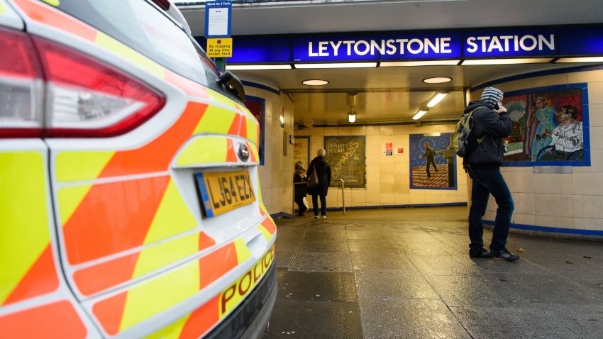 A police car is seen parked outside Leytonstone station in north London on December 6, 2015.
Police were called to reports of people being attacked at Leytonstone around 19:00 GMT on December 5. The police have said that they are considering a knife attack the previous evening as a " terrorist incident" after reports that the man reportedly shouted "this is for Syria". The man was arrested after being Tasered by police. One man suffered serious knife injuries while two others received minor injuries. / AFP / LEON NEAL (Photo credit should read LEON NEAL/AFP/Getty Images)