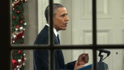 US President Barack Obama addresses the nation from the Oval Office at the White House in Washington, DC, on December 6, 2015. 